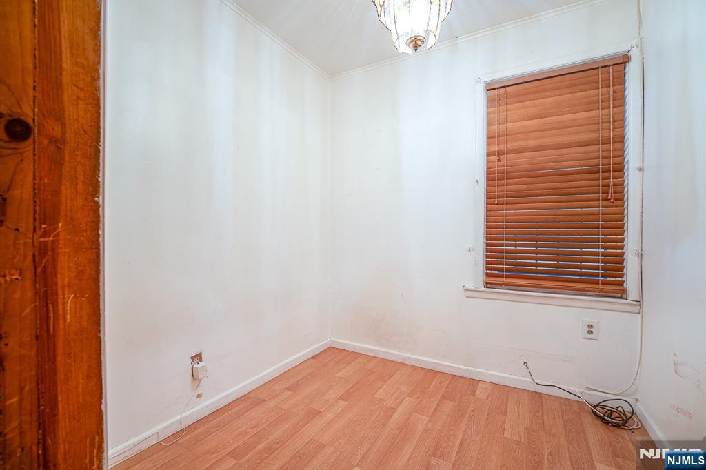 390 Lafayette Street Newark, NJ 07105 - Photo 12 of 40 a view of a room that has a window in it