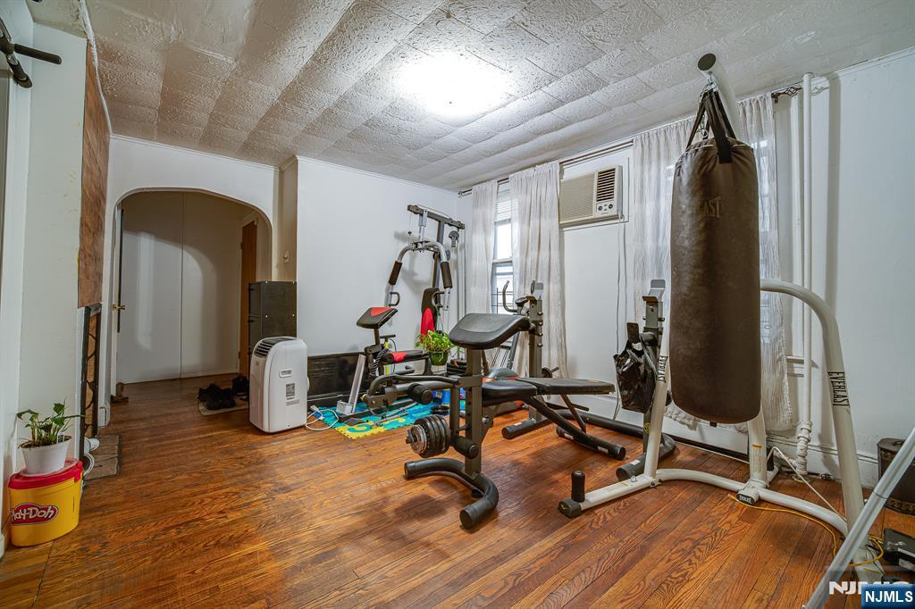 390 Lafayette Street Newark, NJ 07105 - Photo 15 of 40 a view of a room with gym equipment