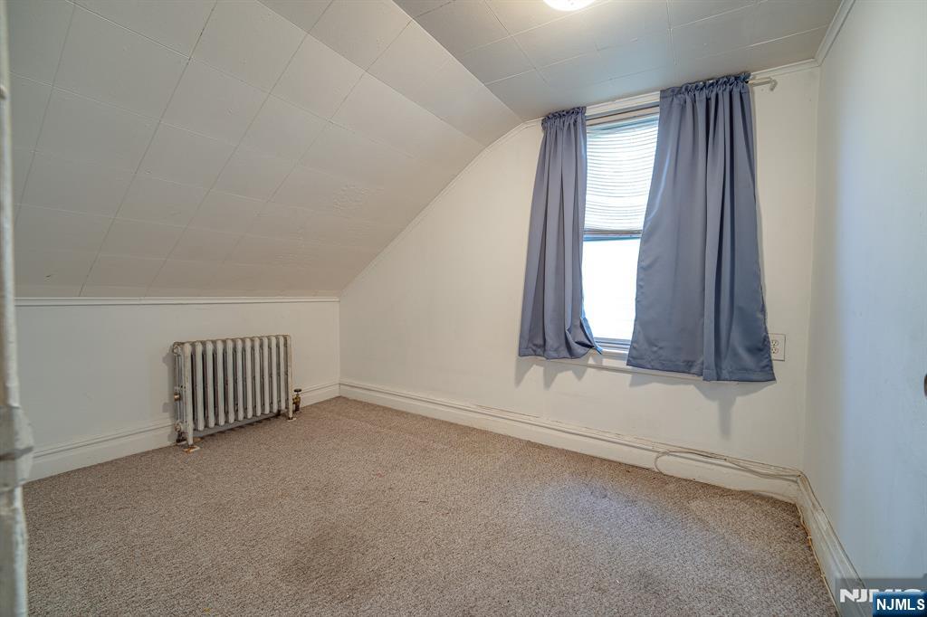 390 Lafayette Street Newark, NJ 07105 - Photo 29 of 40 an empty room with a window