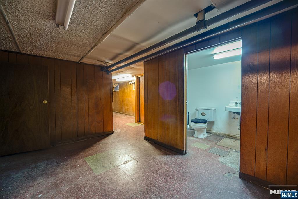 390 Lafayette Street Newark, NJ 07105 - Photo 34 of 40 a view of an empty room and a bathroom