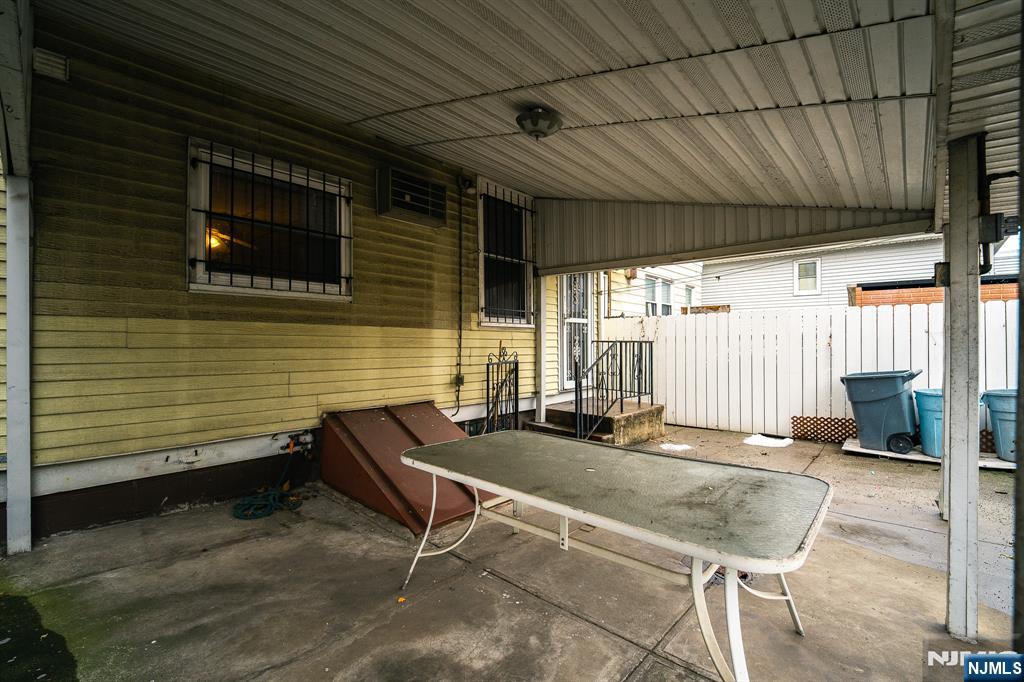 390 Lafayette Street Newark, NJ 07105 - Photo 38 of 40 a backyard of a house with outdoor seating
