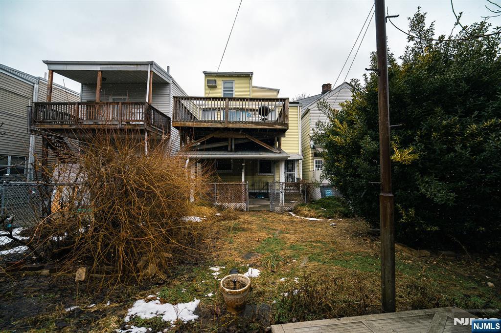390 Lafayette Street Newark, NJ 07105 - Photo 40 of 40 a view of a house with a small yard