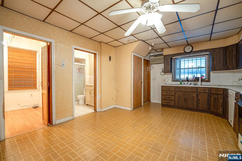 390 Lafayette Street Newark, NJ 07105 - Photo 10 of 40 a bedroom with a bed and a cabinets