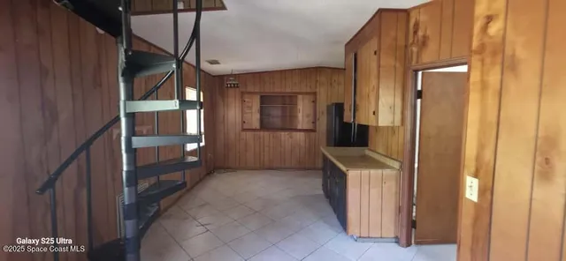 a view of hallway with stairs