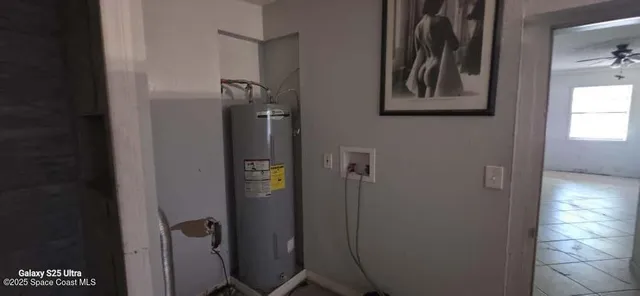 a bathroom with a shower and a sink