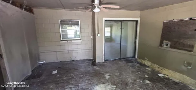 a view of a balcony with wooden floor