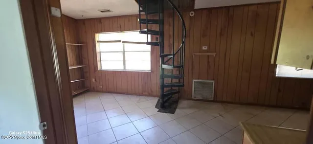 a view of an empty room and window