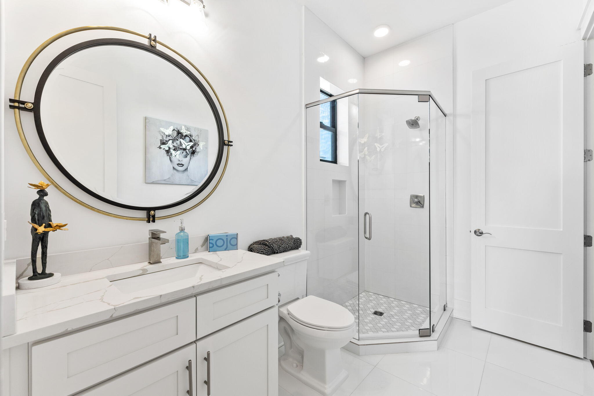 211 Snowdrift Road Miramar Beach, FL 32550 - Photo 31 of 46 a bathroom with a toilet a sink and a mirror