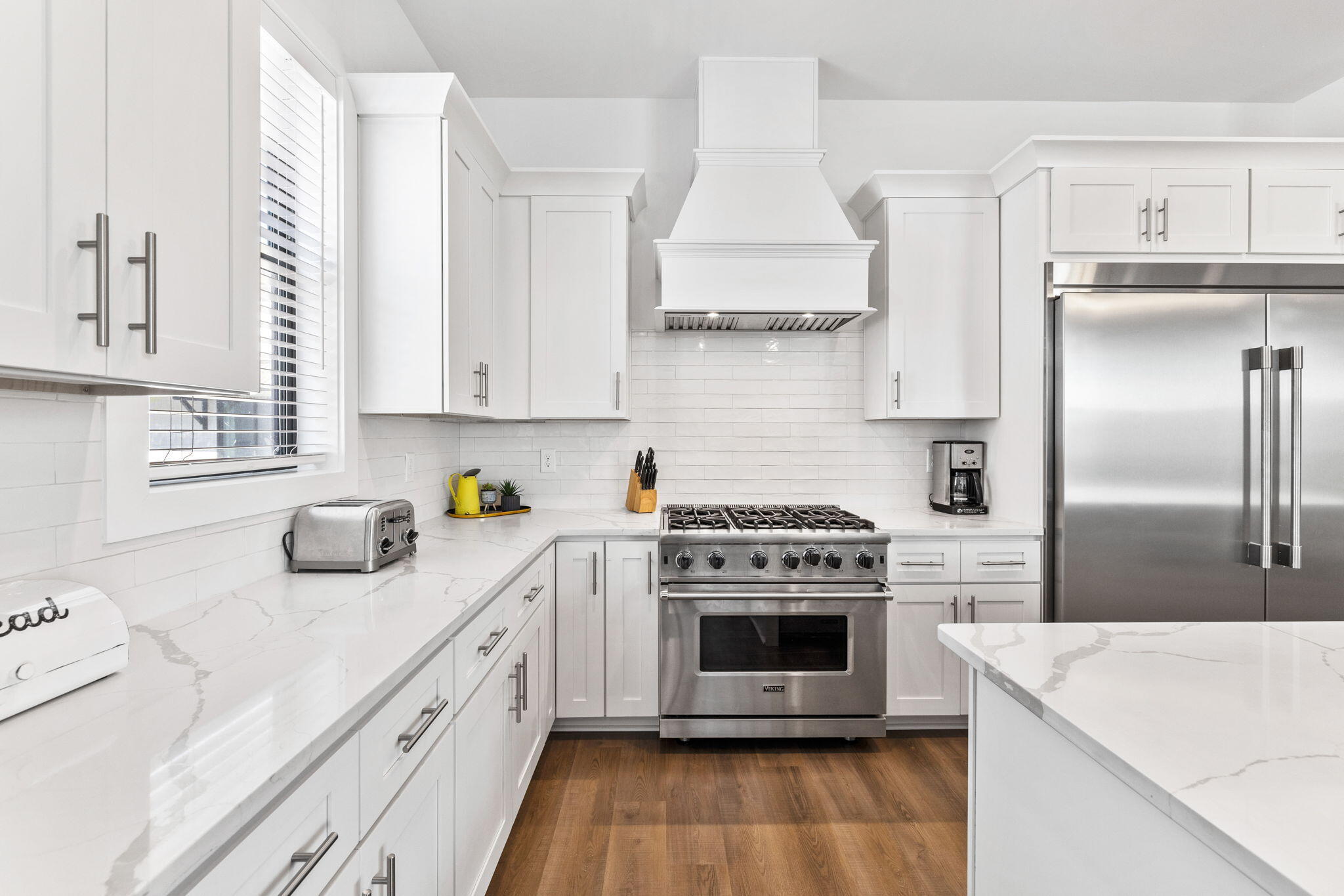 211 Snowdrift Road Miramar Beach, FL 32550 - Photo 9 of 46 a kitchen with stainless steel appliances granite countertop a stove a sink and a refrigerator