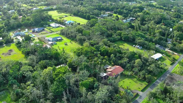 a view of backyard with green space