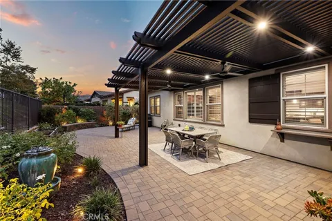 a outdoor space with lots of tables and chairs