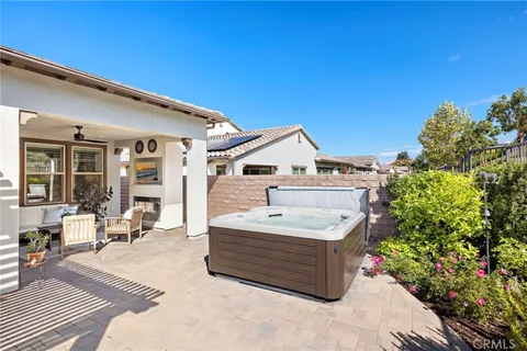 a spacious bathroom with a sink and mirror
