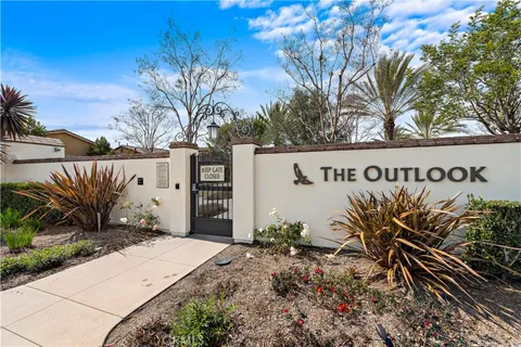 a view of swimming pool with outdoor seating