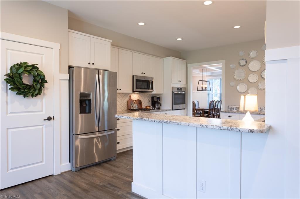 393 Scout Road Lexington, NC 27292 - Photo 13 of 47 View from the breakfast nook, peeking into the kitchen. So bright and open.