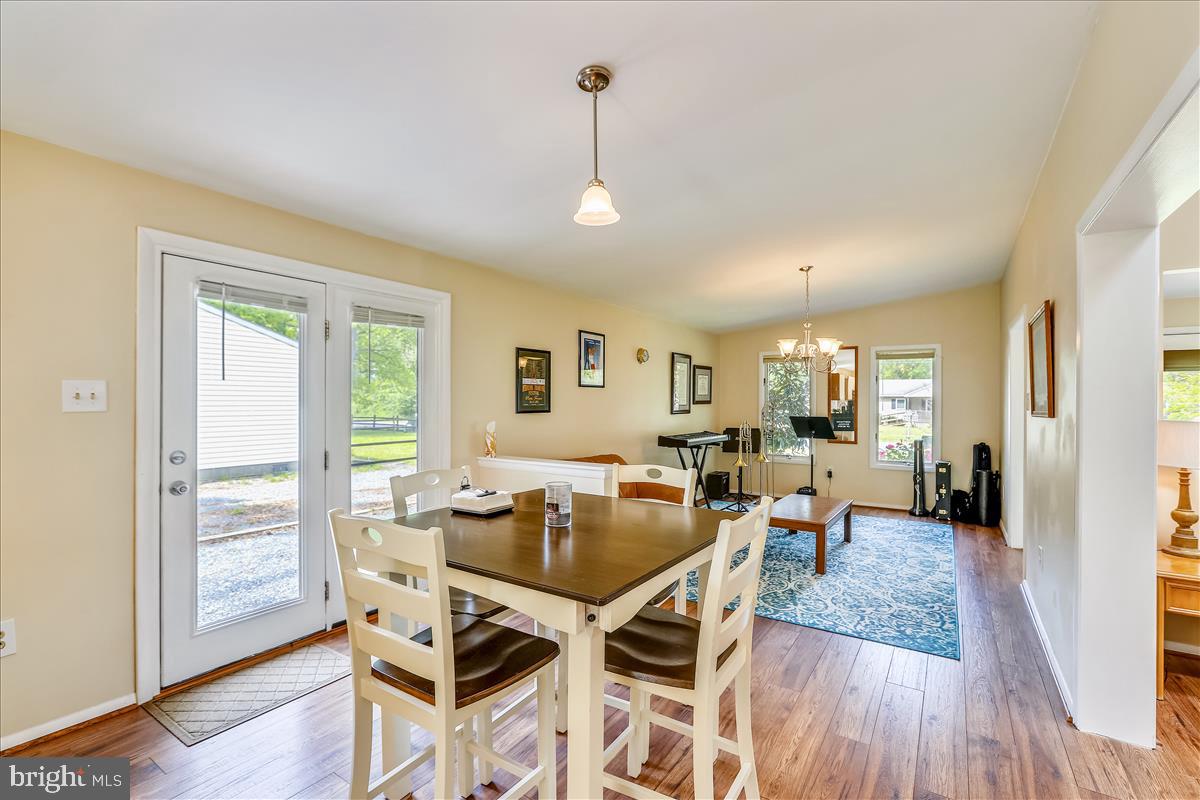 628 Old Love Point Road Stevensville, MD 21666 - Photo 12 of 55 Dining into Great Room