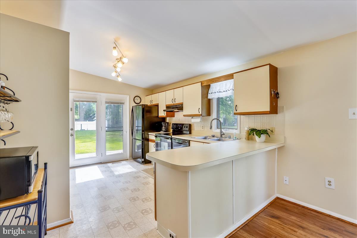 628 Old Love Point Road Stevensville, MD 21666 - Photo 14 of 55 View into Kitchen