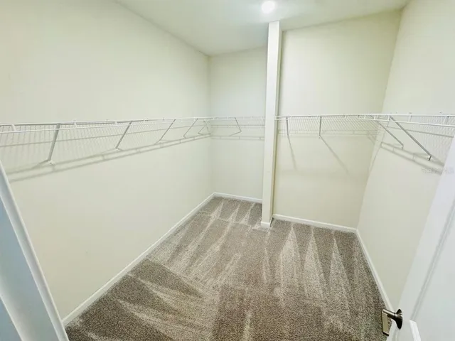 a view of a room with racks on the wall