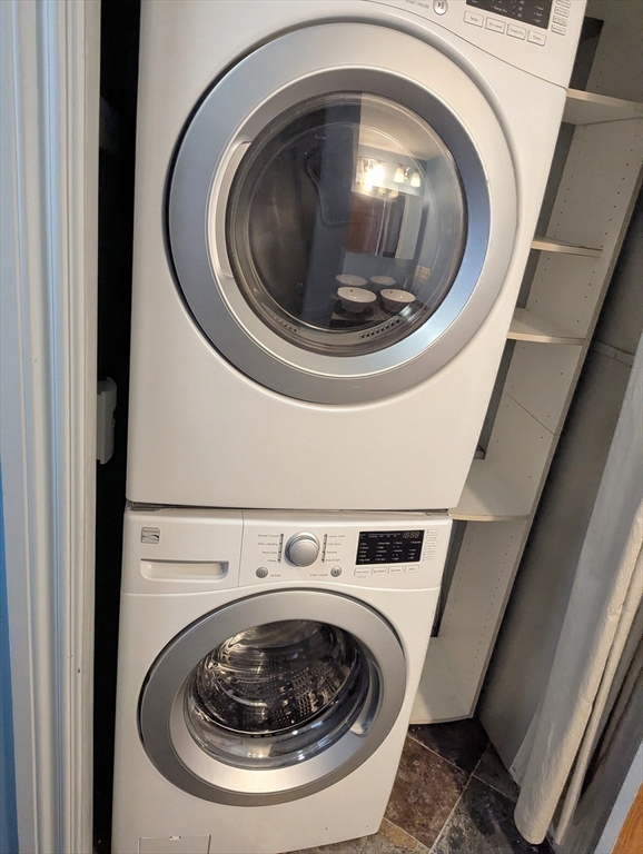176 Hillside Street, Unit 101 Boston, MA 02120 - Photo 18 of 20 a utility room with dryer and washer