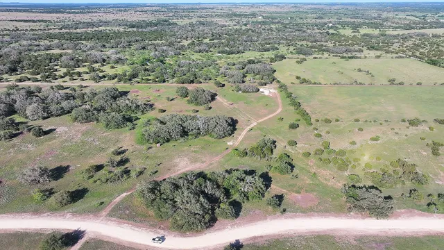 an aerial view of a golf course with a yard