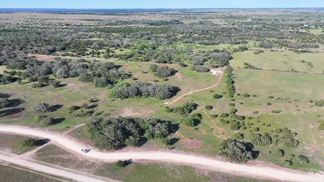 an aerial view of green landscape with outdoor space