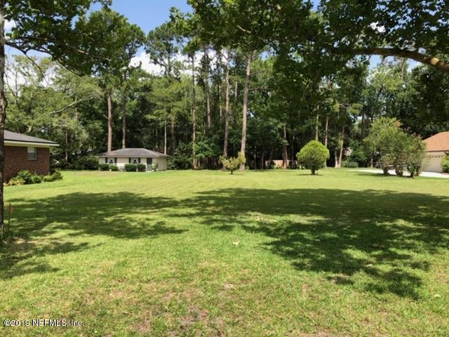 8949 San Rae Road Jacksonville, FL 32257 - Photo 3 of 3 a view of a park with large trees