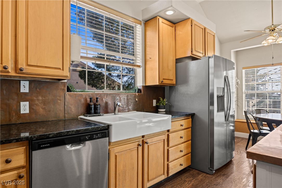 1951 Jim Haworth Court Logandale, NV 89021 - Photo 23 of 63 Kitchen featuring ceiling fan, stainless steel appliances, a sink, and decorative backsplash