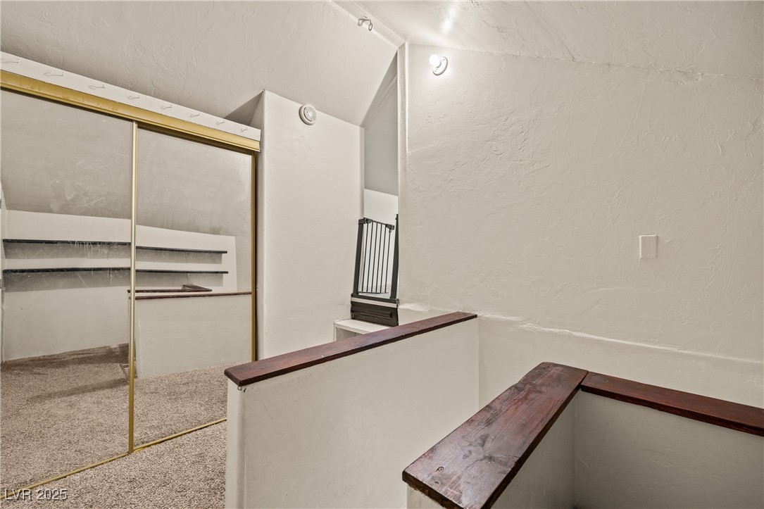1951 Jim Haworth Court Logandale, NV 89021 - Photo 28 of 63 with vaulted ceiling and carpet flooring