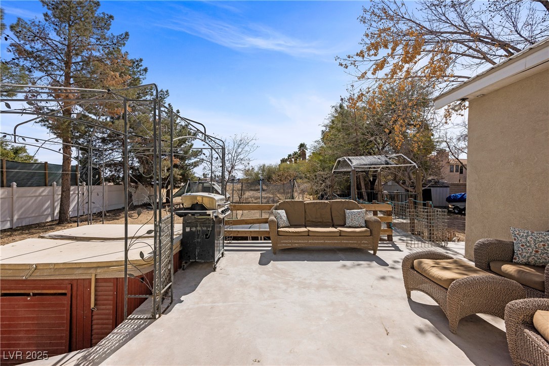 1951 Jim Haworth Court Logandale, NV 89021 - Photo 48 of 63 View of patio featuring a fenced backyard, an outdoor living space, and grilling area
