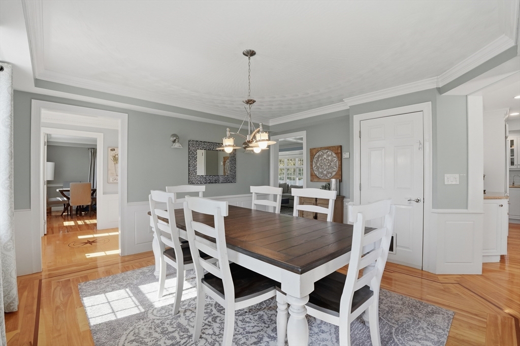 183 Whiting Street Hanover, MA 02339 - Photo 12 of 42 a view of a dining room with furniture and window