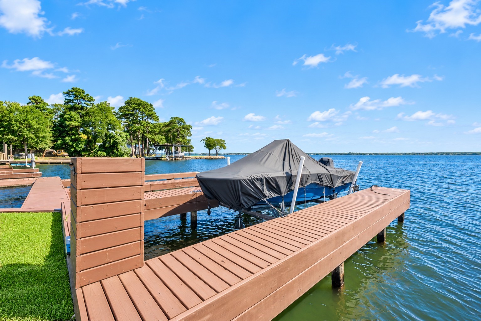 801 River Road, Unit 112F Montgomery, TX 77356 - Photo 23 of 27 Private Boat Slip #94 offers direct access to the open waters of Lake Conroe. The dock was completely rebuilt at the end of 2025, while the boat lift was existing, providing a convenient setup for enjoying the lake lifestyle just steps from the condo.