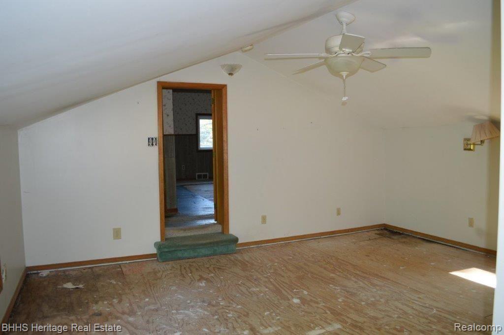 2450 East Coon Lake Road Howell, MI 48843 - Photo 45 of 49 Master bedroom