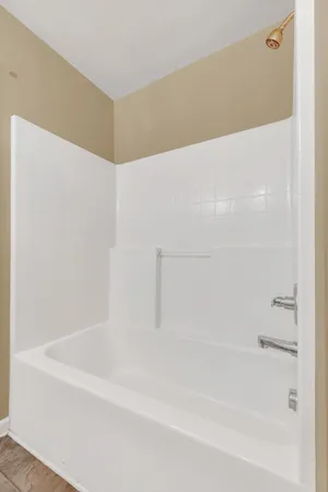 a bathroom with a bathtub