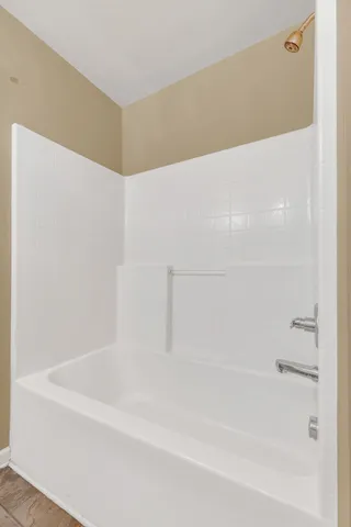 a bathroom with a bathtub