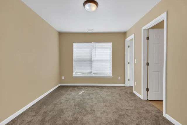 an empty room with window