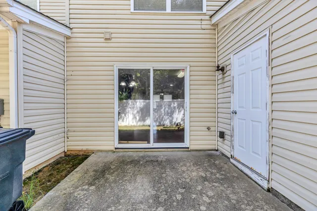 a view of a porch with a door