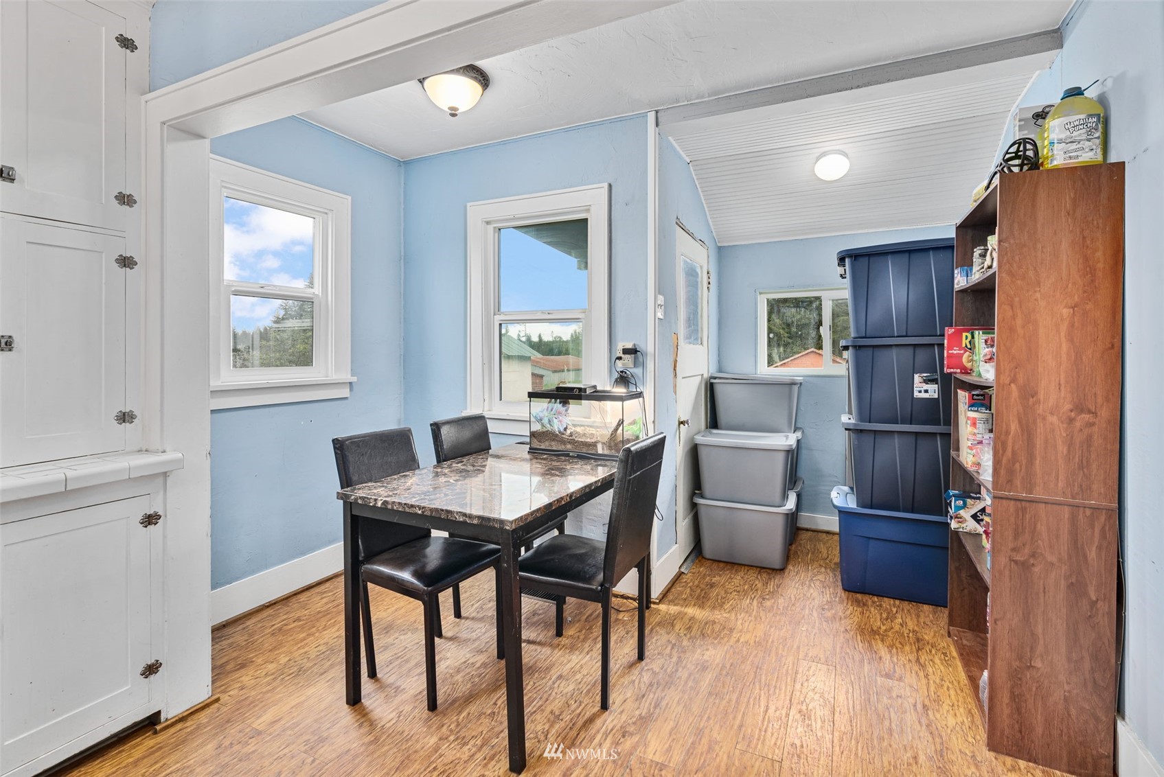 104 Reinseth Road Winlock, WA 98596 - Photo 11 of 35 a view of a dining room with furniture window and wooden floor