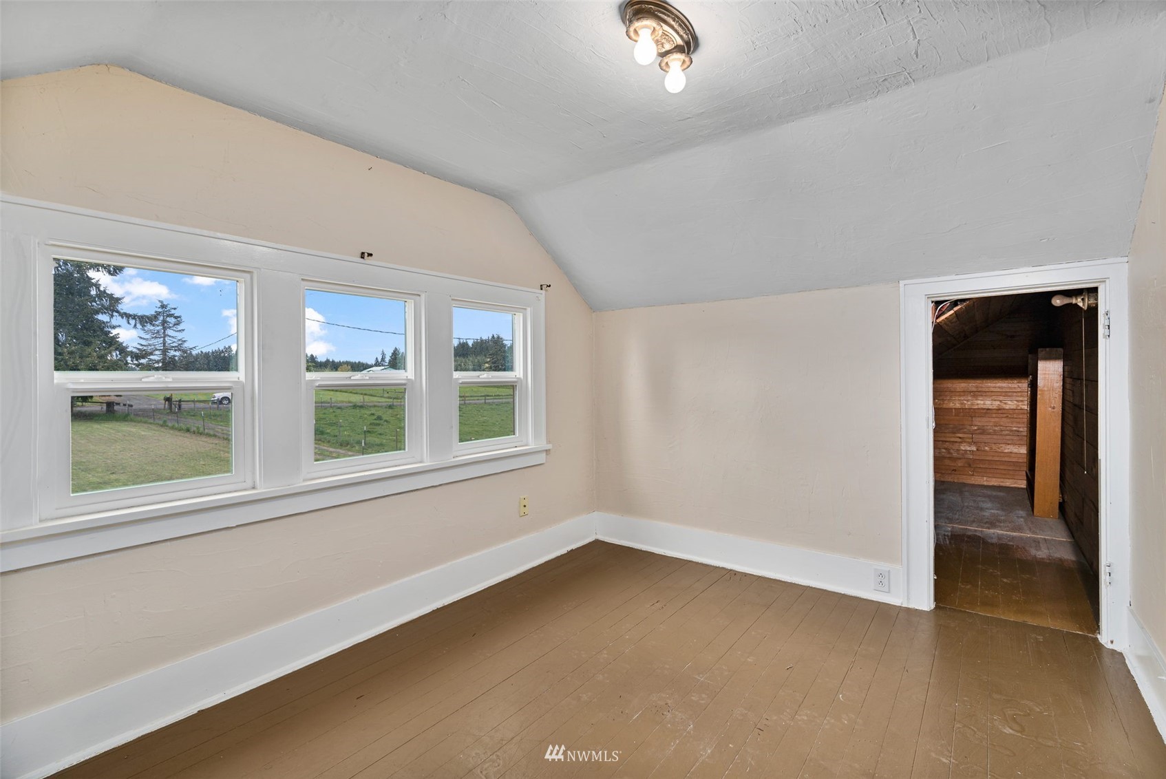 104 Reinseth Road Winlock, WA 98596 - Photo 17 of 35 an empty room with windows
