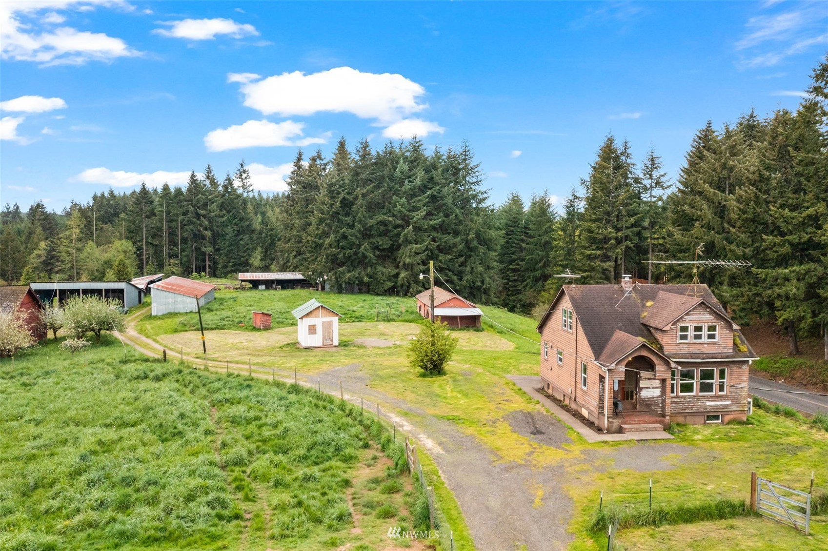 104 Reinseth Road Winlock, WA 98596 - Photo 28 of 35 a view of a house with pool and chairs