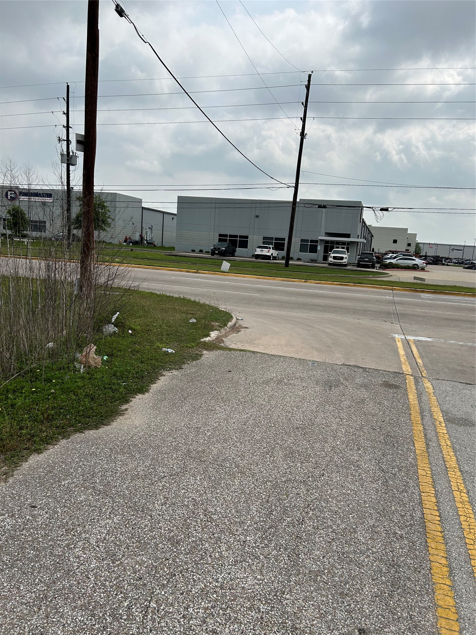 a view of a swimming pool with a yard