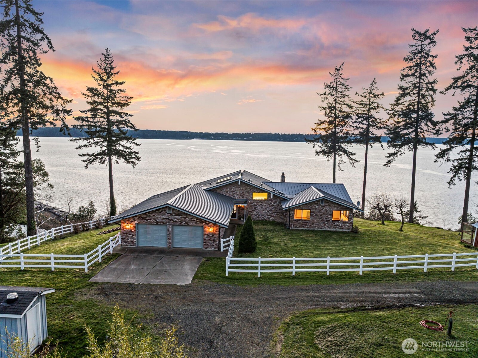 17510 88th Street Southwest Longbranch, WA 98351 - Photo 1 of 40 a view of a house with a yard and sitting area