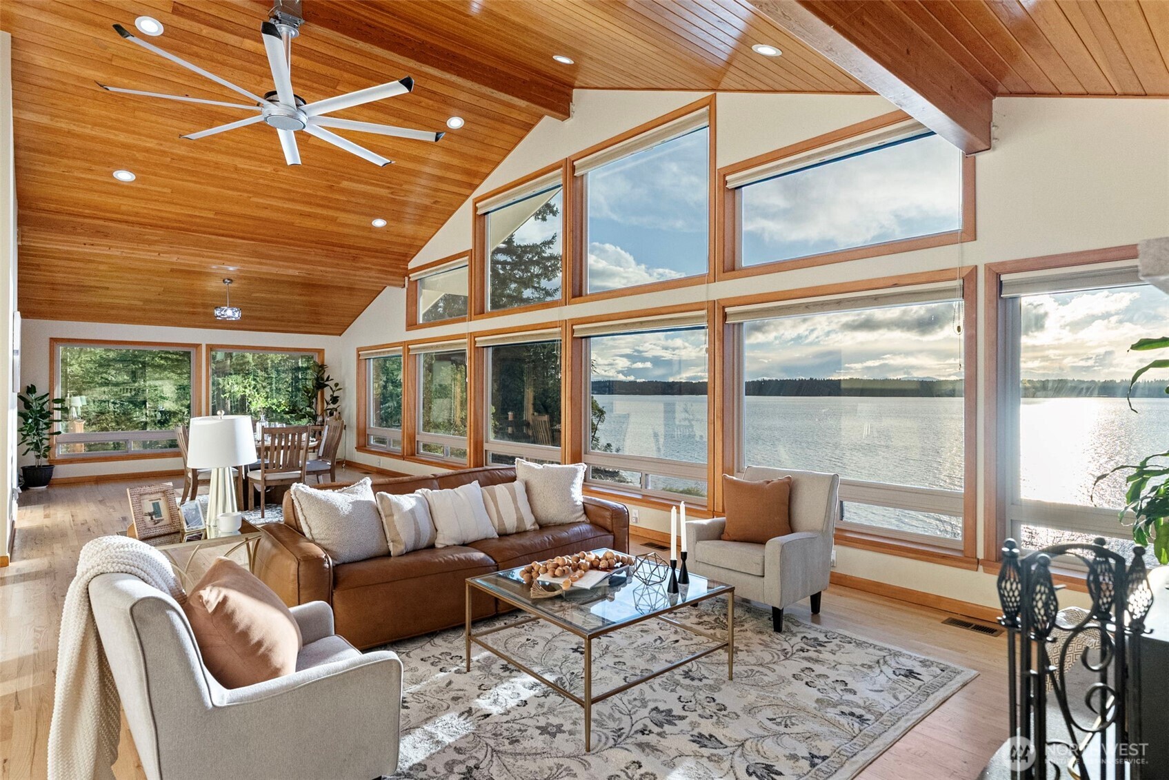 17510 88th Street Southwest Longbranch, WA 98351 - Photo 12 of 40 a living room with furniture and a large window