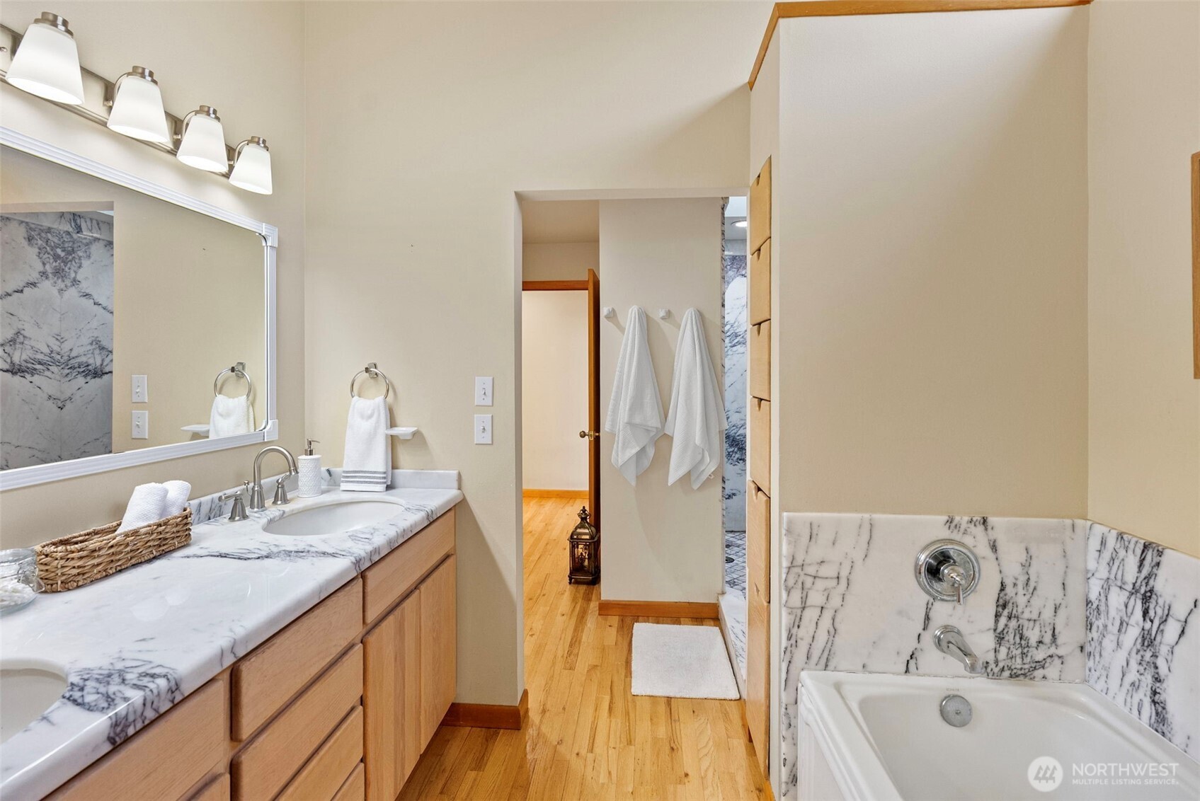 17510 88th Street Southwest Longbranch, WA 98351 - Photo 19 of 40 a bathroom with a granite countertop sink and a mirror