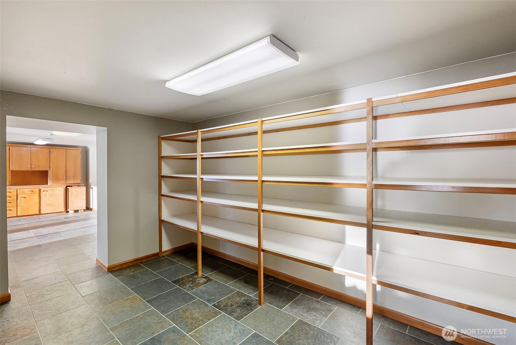 17510 88th Street Southwest Longbranch, WA 98351 - Photo 30 of 40 a view of an empty room with empty shelves