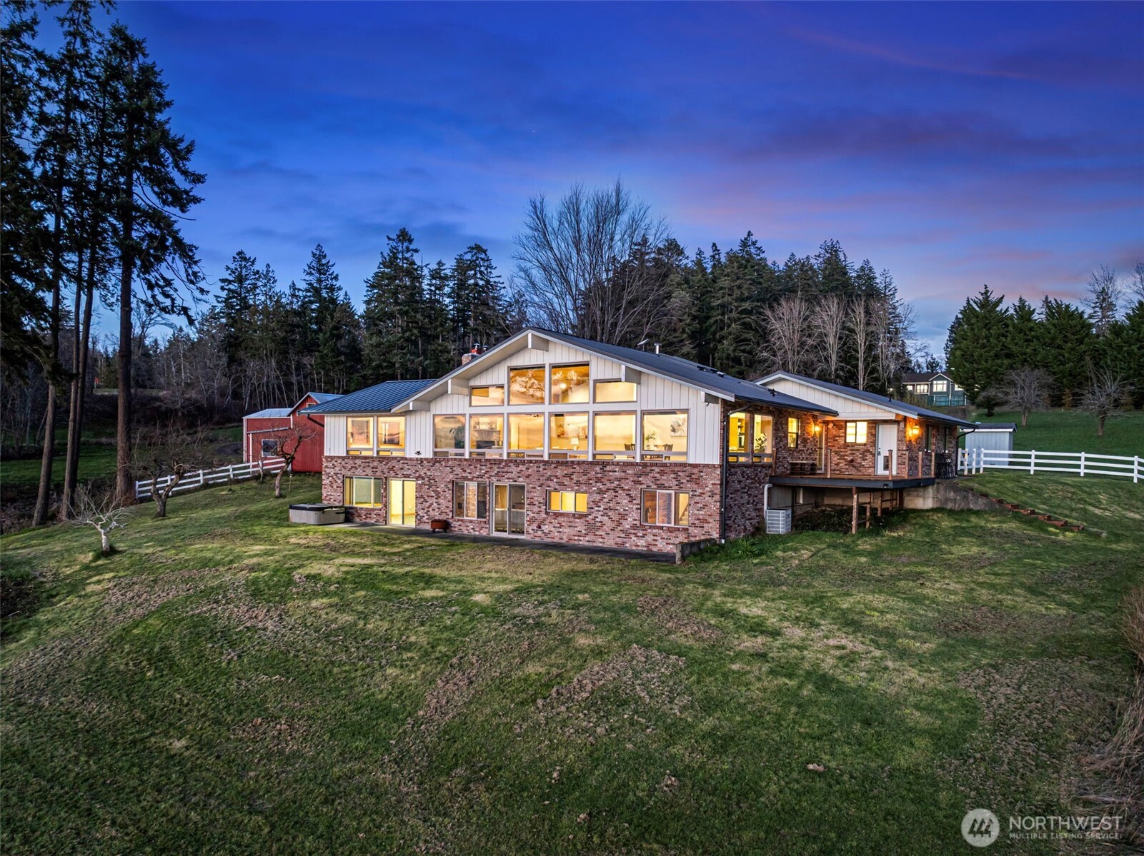 17510 88th Street Southwest Longbranch, WA 98351 - Photo 36 of 40 a view of a house with a yard and sitting area