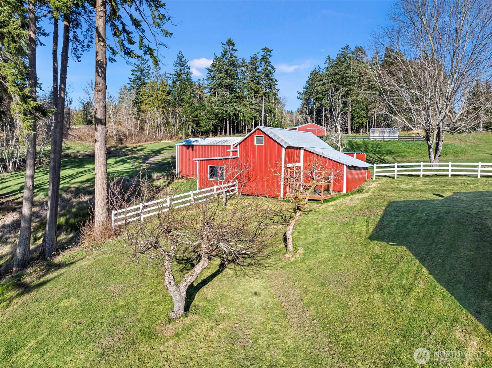 17510 88th Street Southwest Longbranch, WA 98351 - Photo 38 of 40 a view of a swimming pool with a bench in front of house
