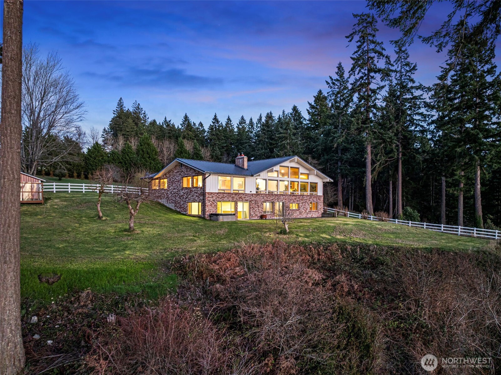 17510 88th Street Southwest Longbranch, WA 98351 - Photo 6 of 40 a view of a house with a big yard and a large tree