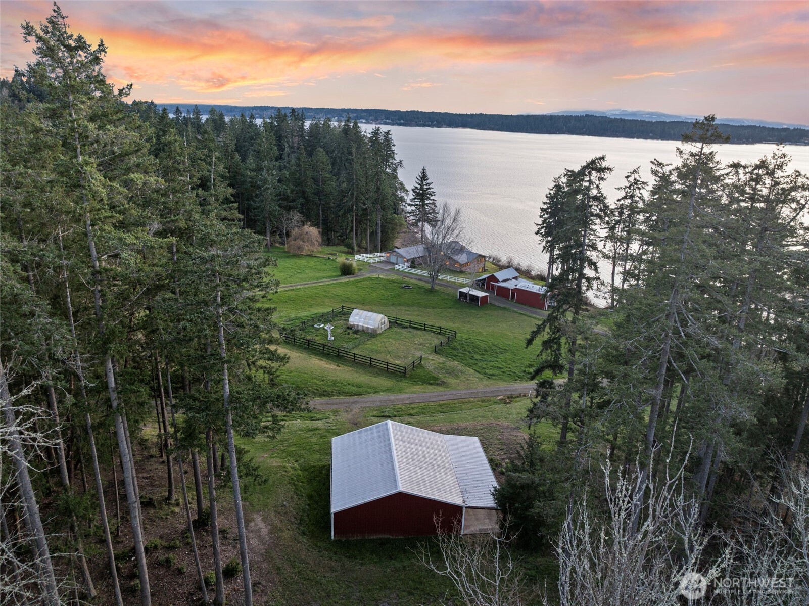 17510 88th Street Southwest Longbranch, WA 98351 - Photo 7 of 40 a view of a wooden bridge and a lake view