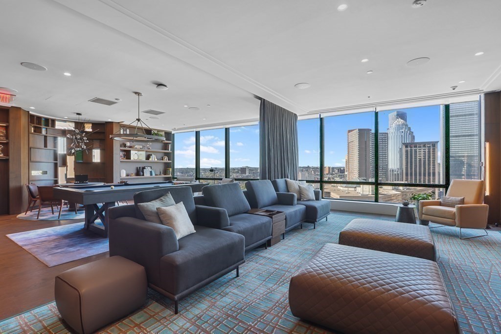 40 Trinity Place, Unit 1612 Boston, MA 02116 - Photo 21 of 38 a living room with furniture and a large window