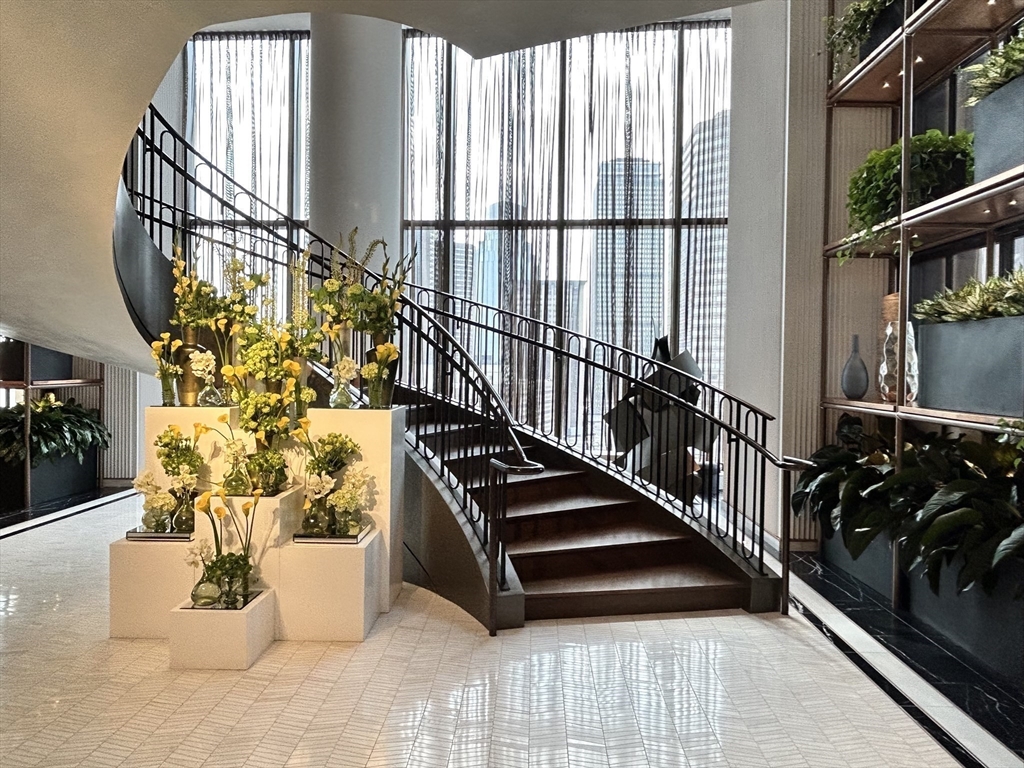 40 Trinity Place, Unit 1612 Boston, MA 02116 - Photo 25 of 38 a view of entryway and hall with wooden floor