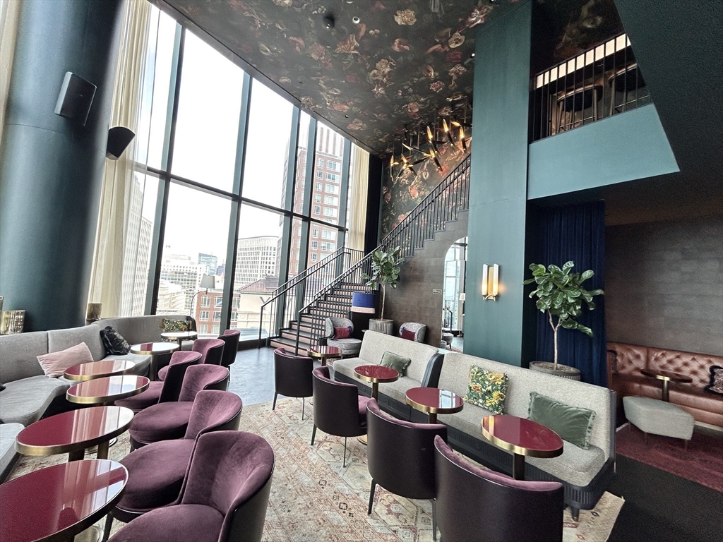 40 Trinity Place, Unit 1612 Boston, MA 02116 - Photo 33 of 38 a living room with furniture and a window